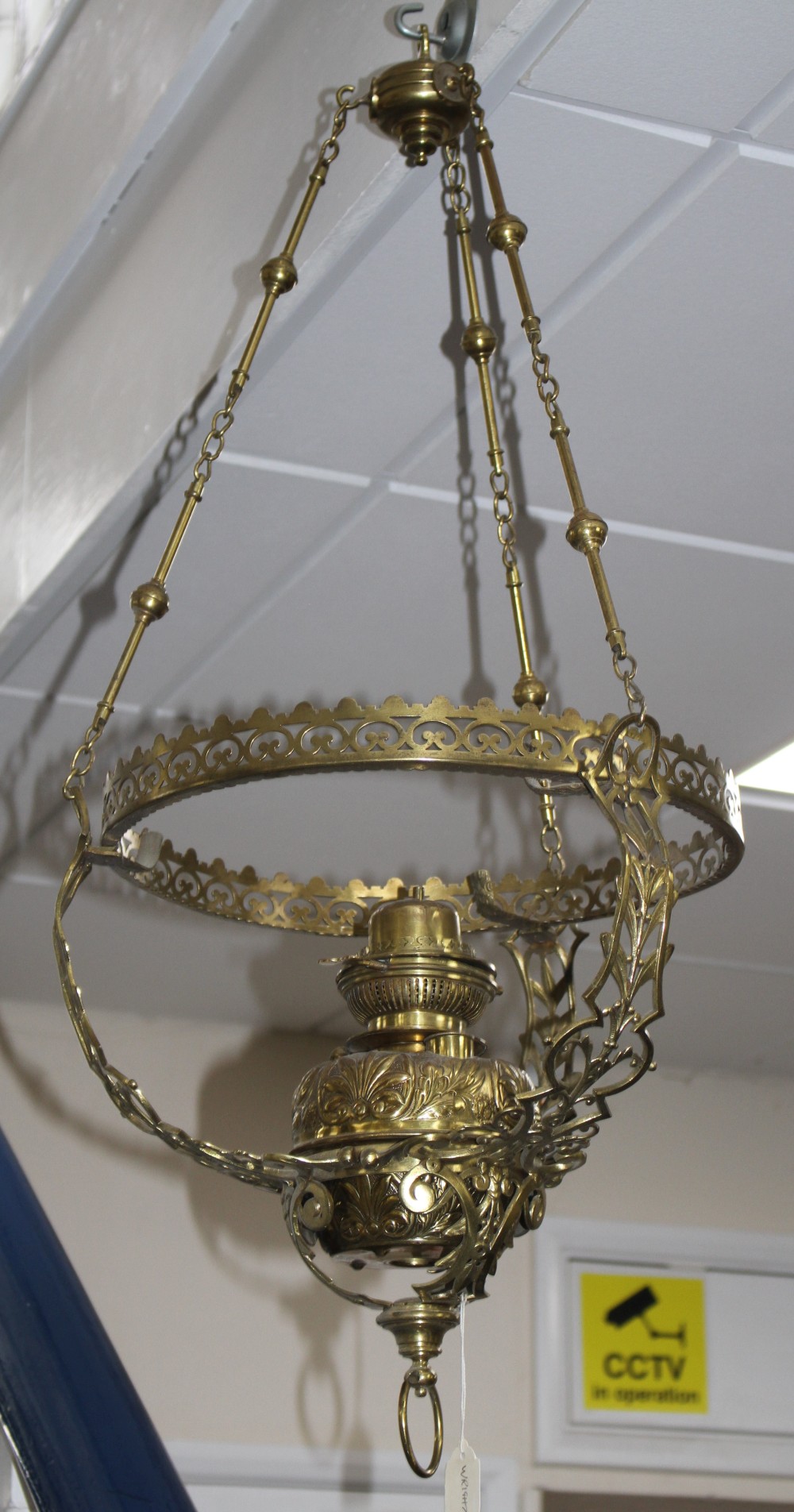 A late Victorian brass hanging oil lamp, drop 84cm